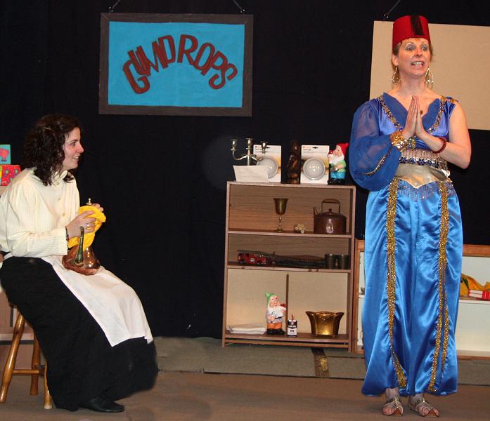 Amy & genie A.jpg - Amy listens as the Genie explains about the three wishes.